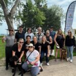 Employees and family from DKI-CRCS stand together for a photo along with CEO of Their Opportunity before 5km charity walk along the Oshawa waterfront